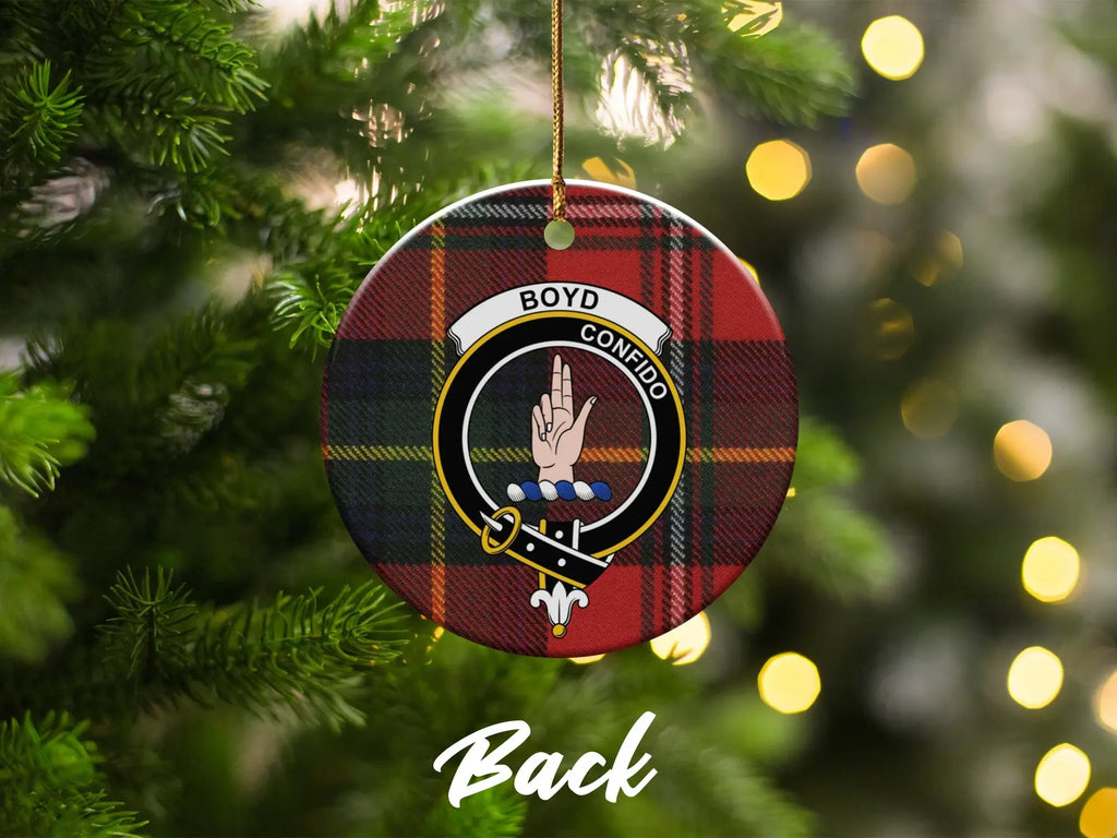 Boyd crest ornament on Christmas tree — red and green tartan with Confido motto visible