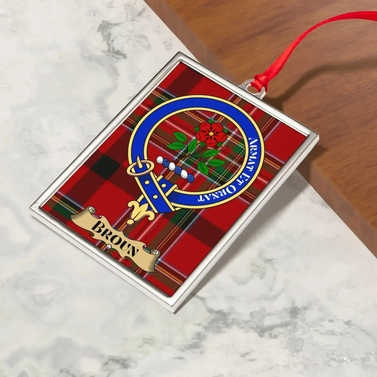 Broun family-name crest detail on the framed ornament
