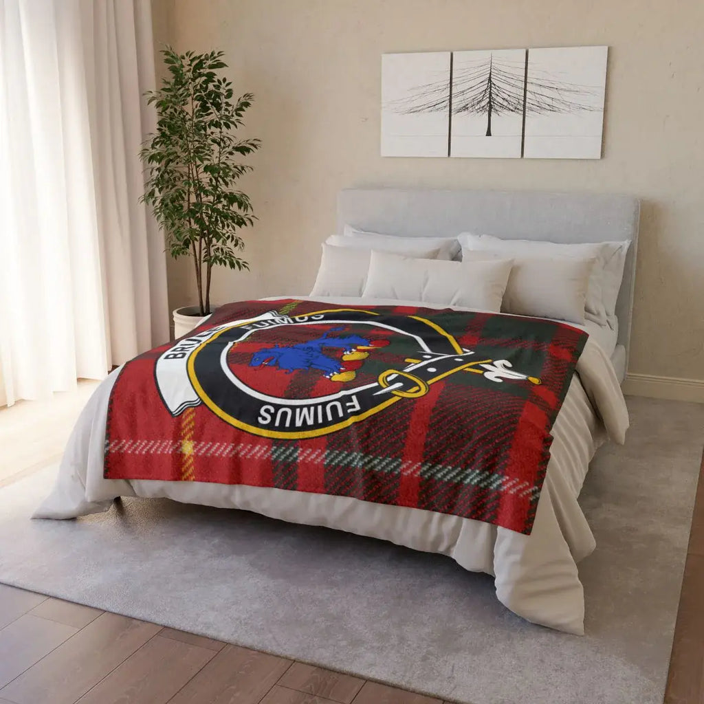 Bruce tartan throw blanket folded — lightweight printed polyester with hemmed edges