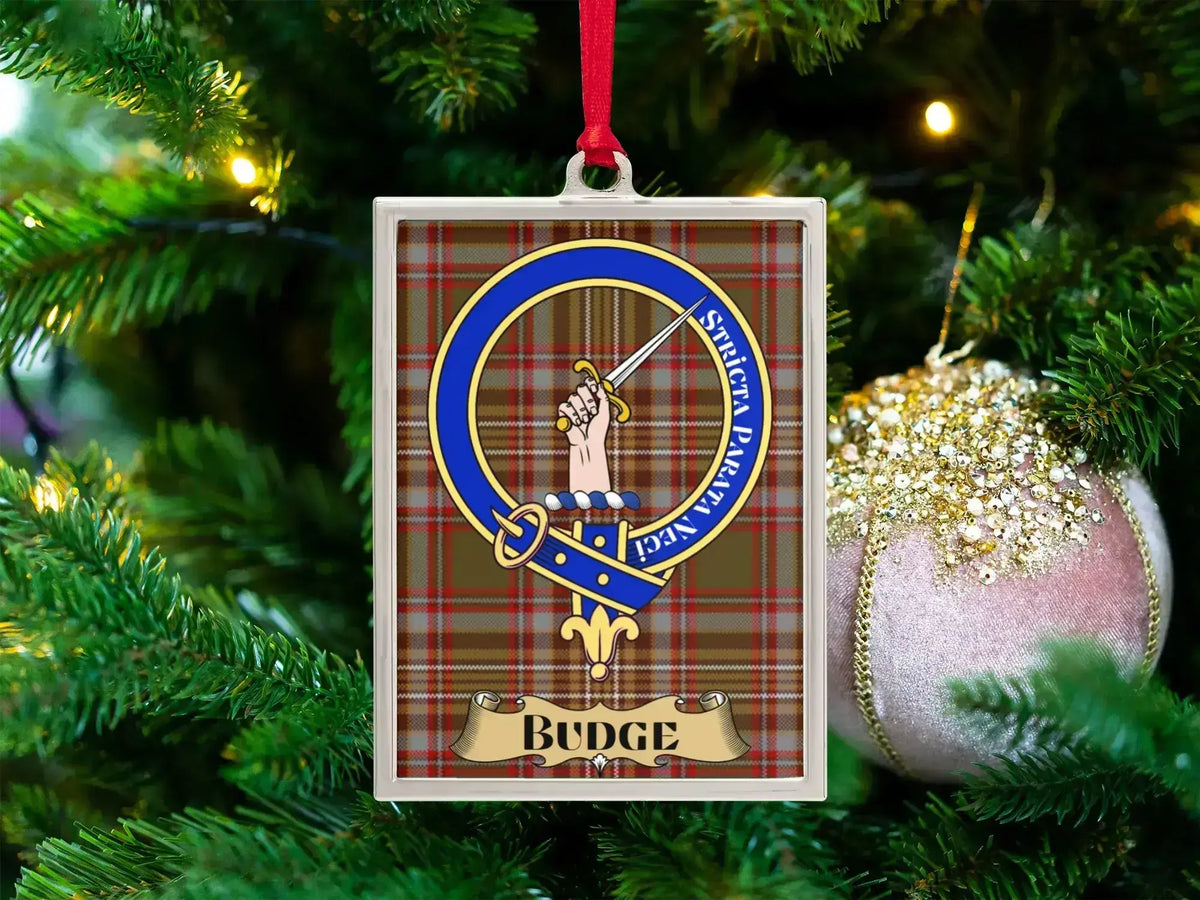 Budge clan crest Christmas ornament in a silver frame on a tartan background