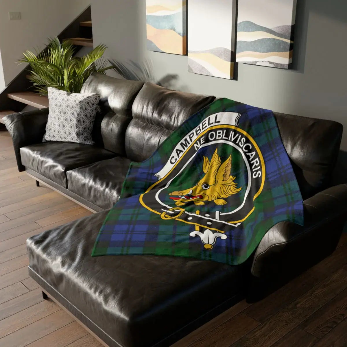 Campbell clan crest tartan throw blanket — 50x60 polyester with boar's head print on sofa