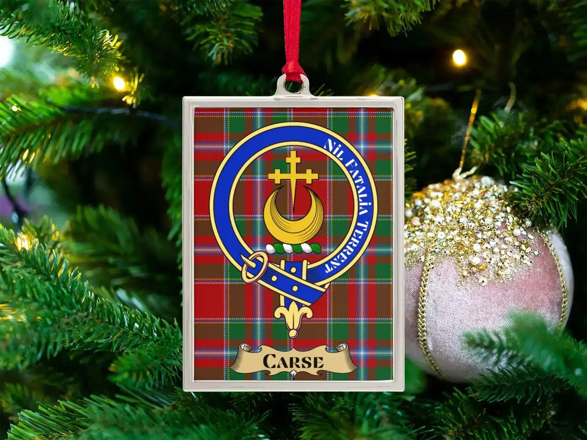 Carse clan crest Christmas ornament in a silver frame on a tartan background