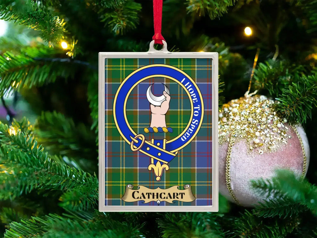 Cathcart clan crest Christmas ornament in a silver frame on a tartan background