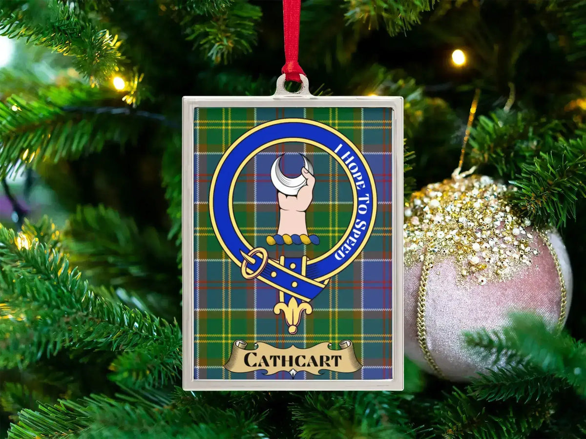 Cathcart clan crest Christmas ornament in a silver frame on a tartan background