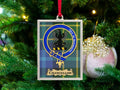 Chancellor clan crest Christmas ornament in a silver frame on a tartan background