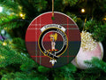 Chisholm clan tartan ceramic ornament — 3-inch round glossy disc with crest and Feros Ferio motto