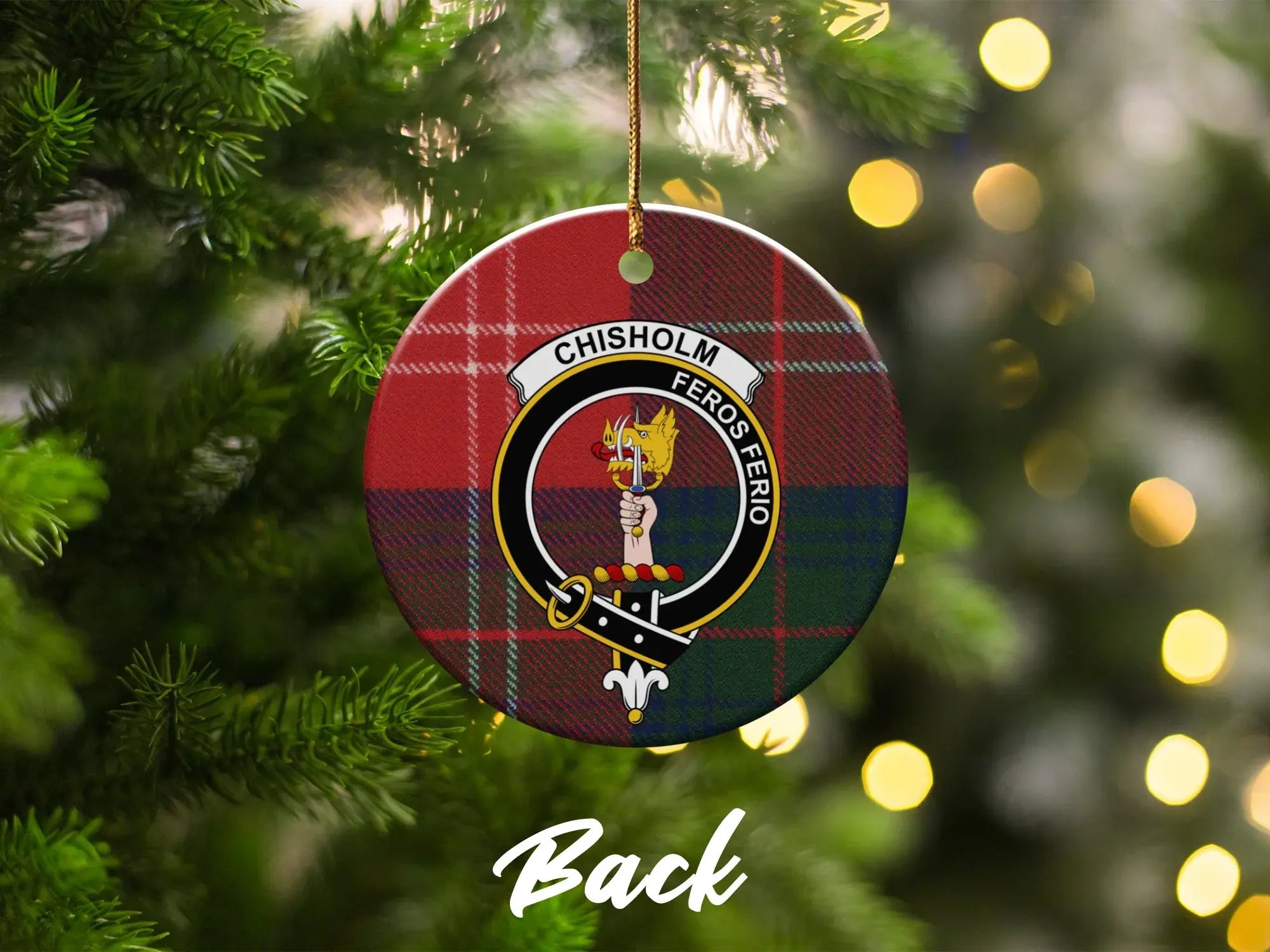Chisholm clan tartan ornament on Christmas tree — green and red heraldic design on ceramic