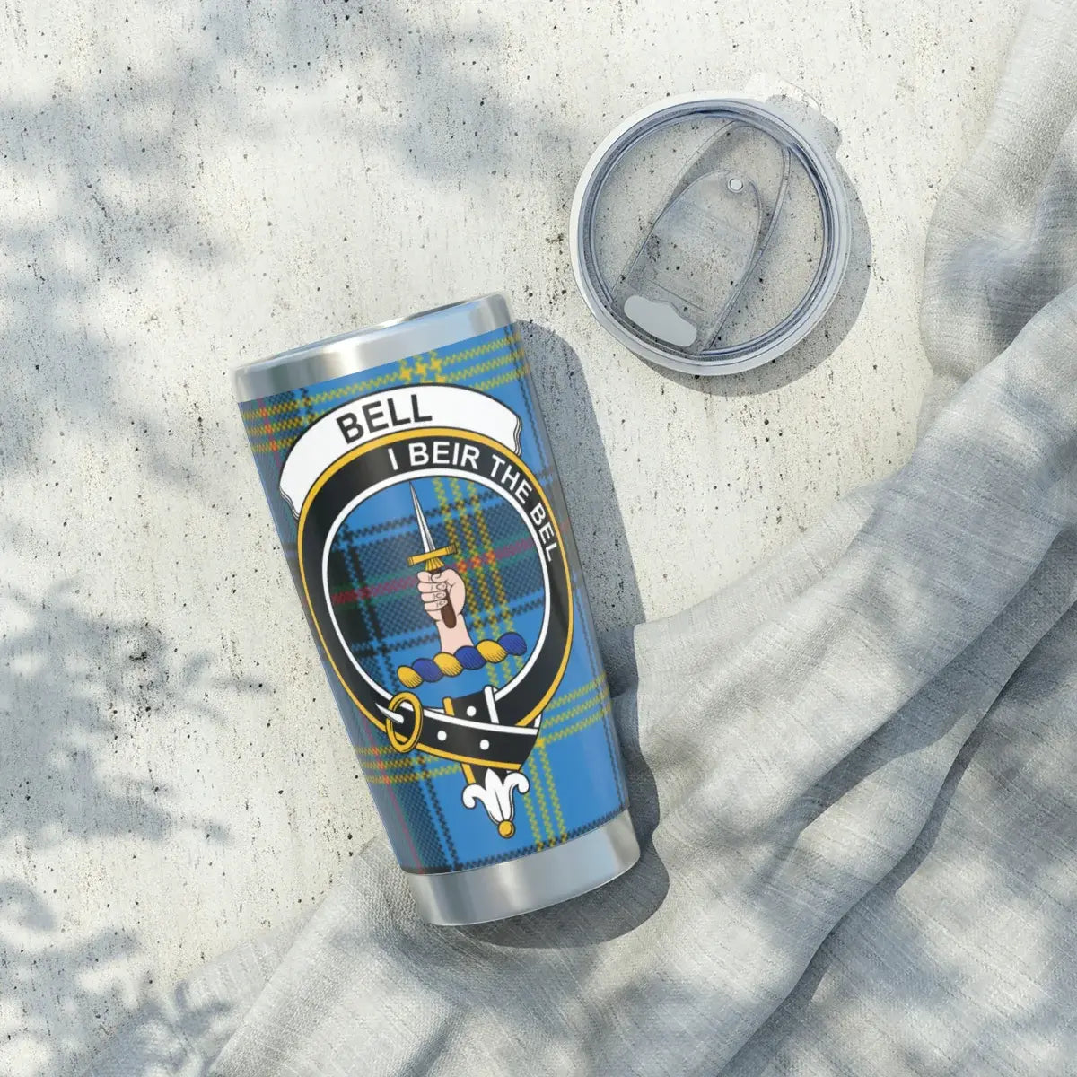 Clan Bell I Beir the Bel tartan tumbler lifestyle shot — clan crest on silver 20oz stainless cup