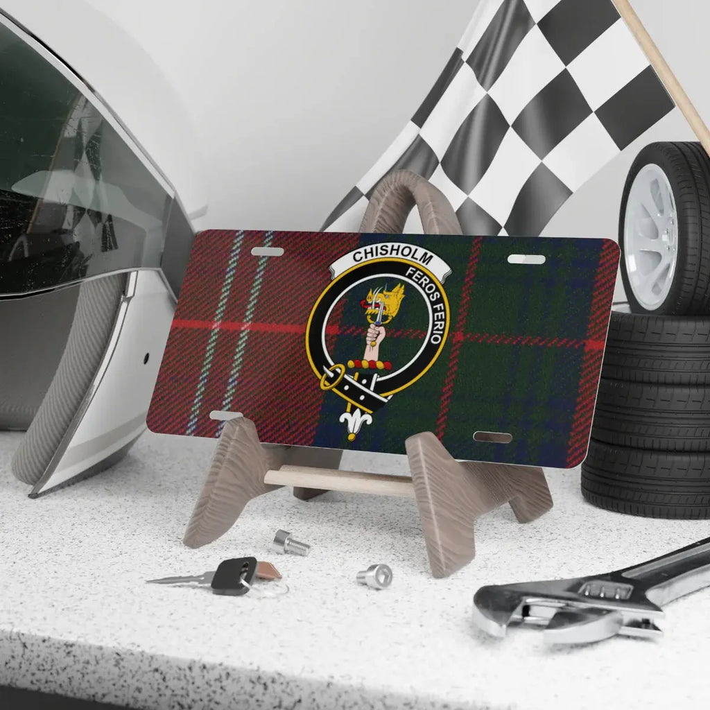 Chisholm clan crest novelty license plate — 12x6 aluminium with green-red tartan and Feros Ferio