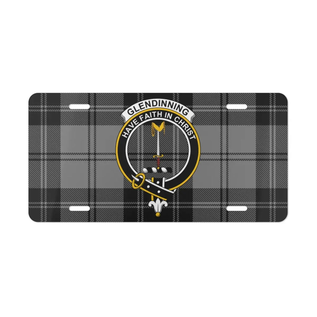 Glendinning tartan crest license plate — front view showing clan crest and motto on white aluminium