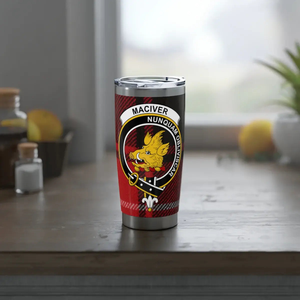 MacIver clan crest tumbler showing tartan wrap — slim profile fits car cup holders