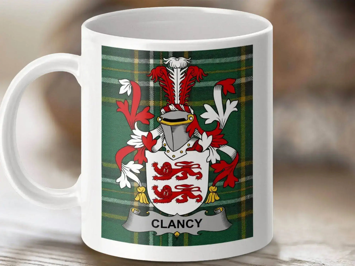 White mug with Clancy family crest featuring red lions and knight helmet on green tartan background