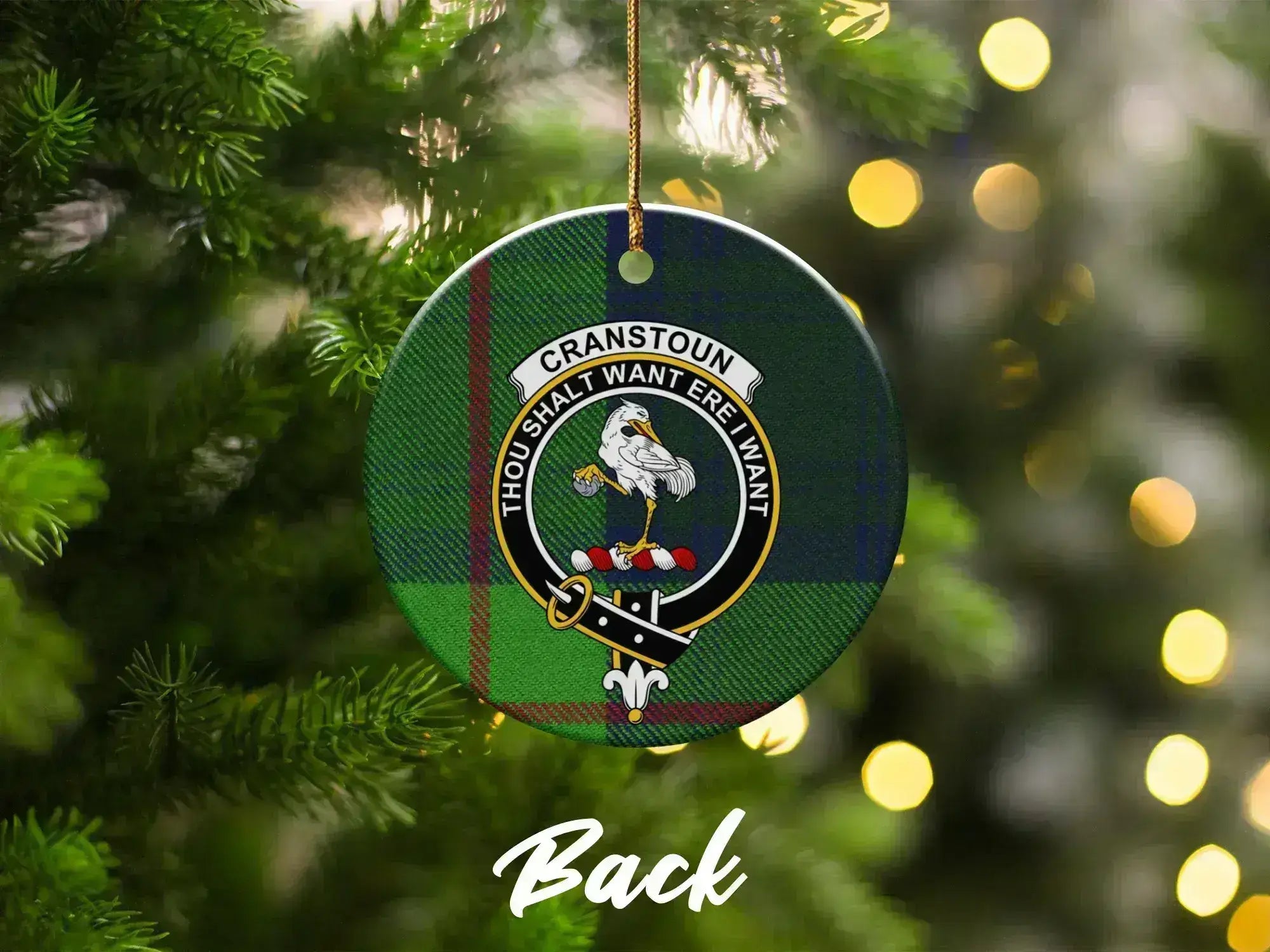 Clan Cranstoun Christmas ornament close-up — round ceramic, crest and motto Thou Shalt Want Ere I Want