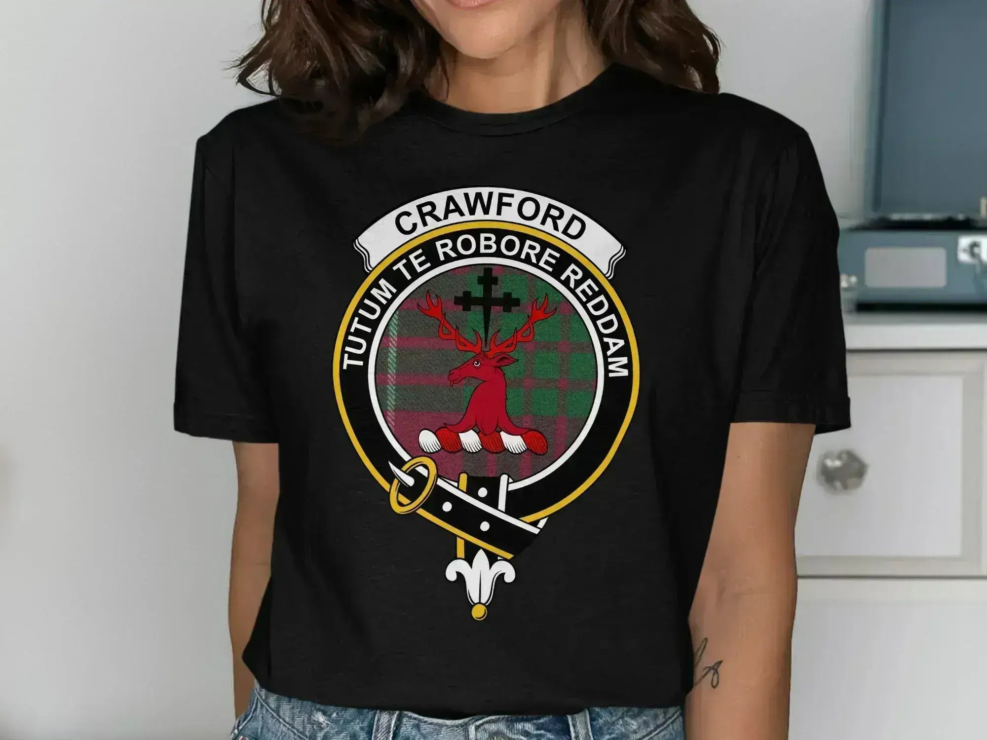 Crawford family crest tartan graphic tee — stag design on red-green plaid cotton