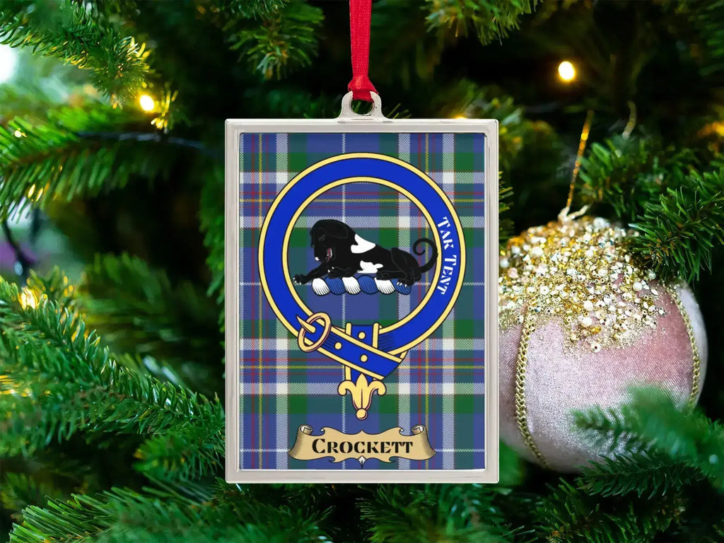 Crockett clan crest Christmas ornament in a silver frame on a tartan background