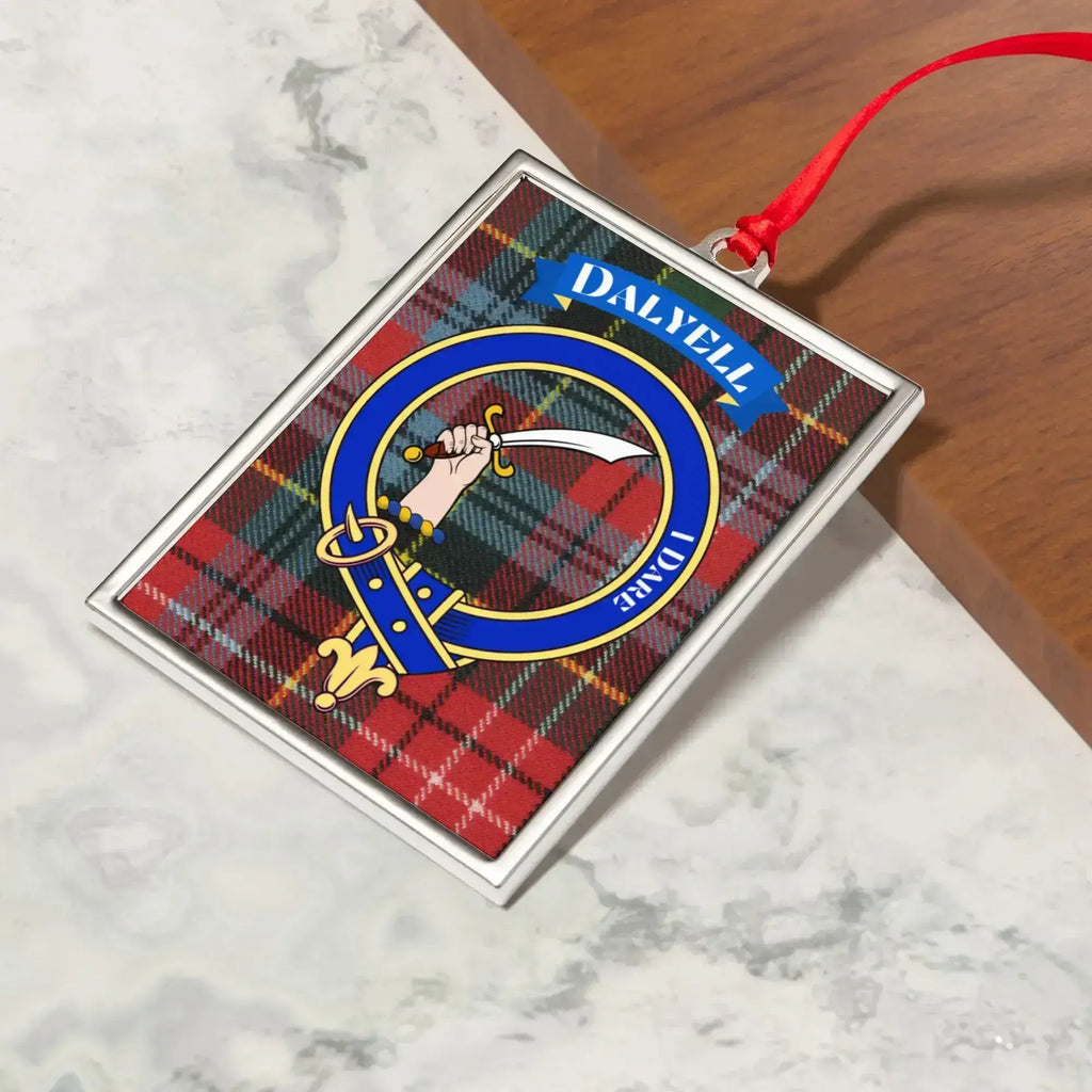 Dalyell ornament hanging from a Christmas tree branch by its satin ribbon