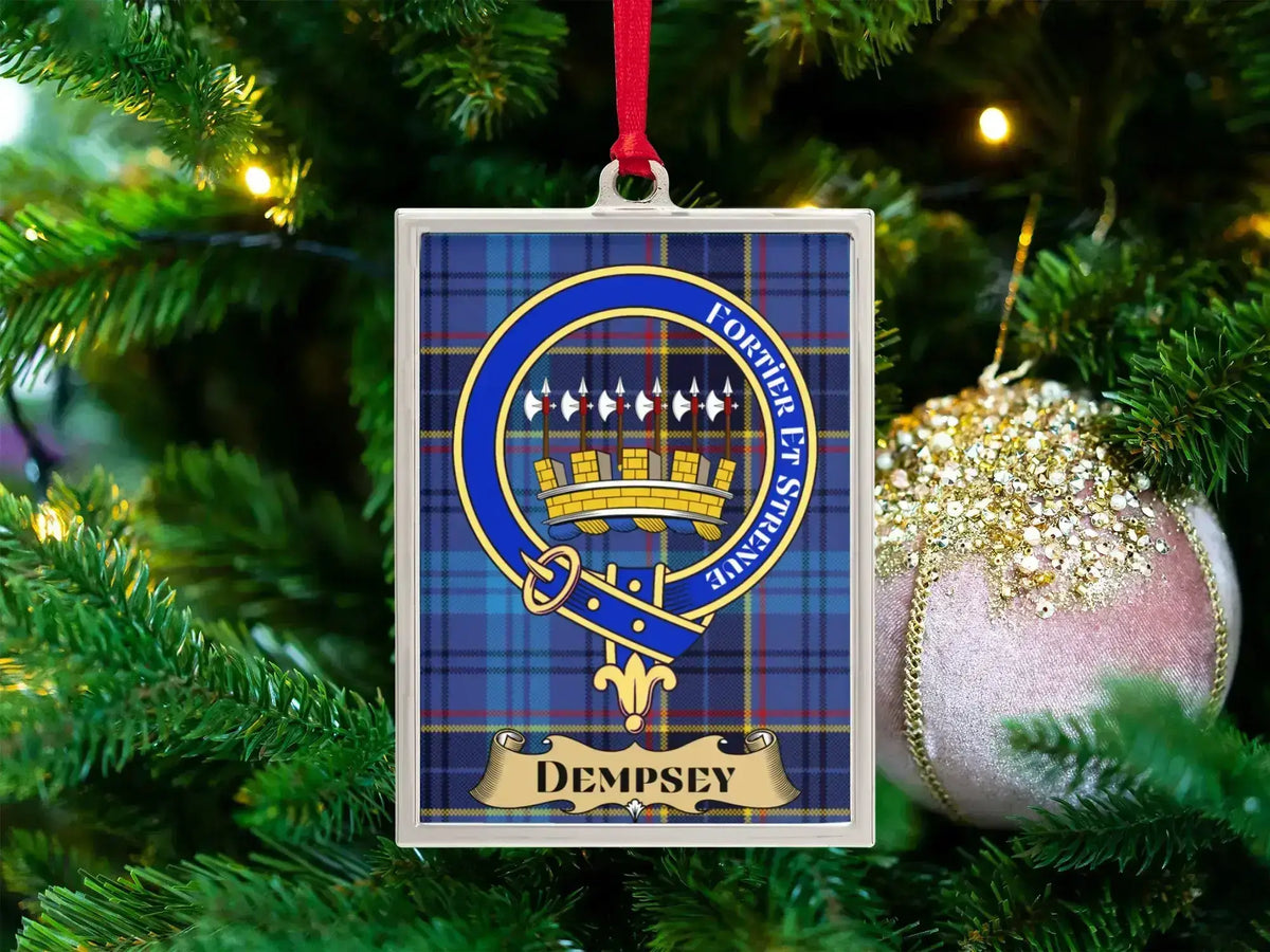 Dempsey clan crest Christmas ornament in a silver frame on a tartan background