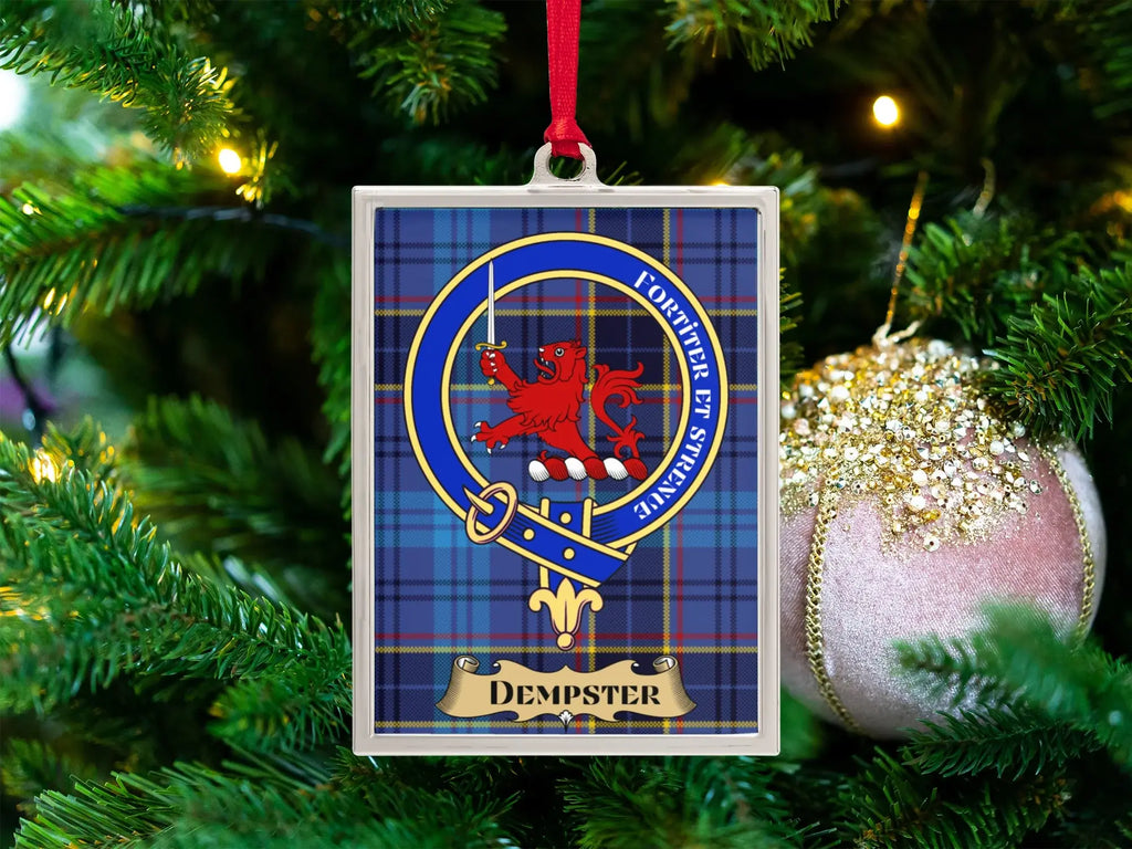 Dempster clan crest Christmas ornament in a silver frame on a tartan background