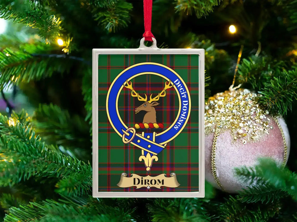 Dirom clan crest Christmas ornament in a silver frame on a tartan background