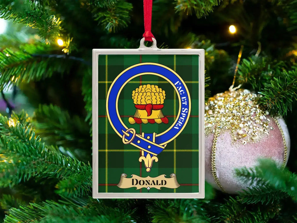 Donald clan crest Christmas ornament in a silver frame on a tartan background