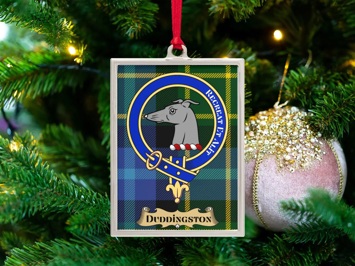 Duddingston clan crest Christmas ornament in a silver frame on a tartan background