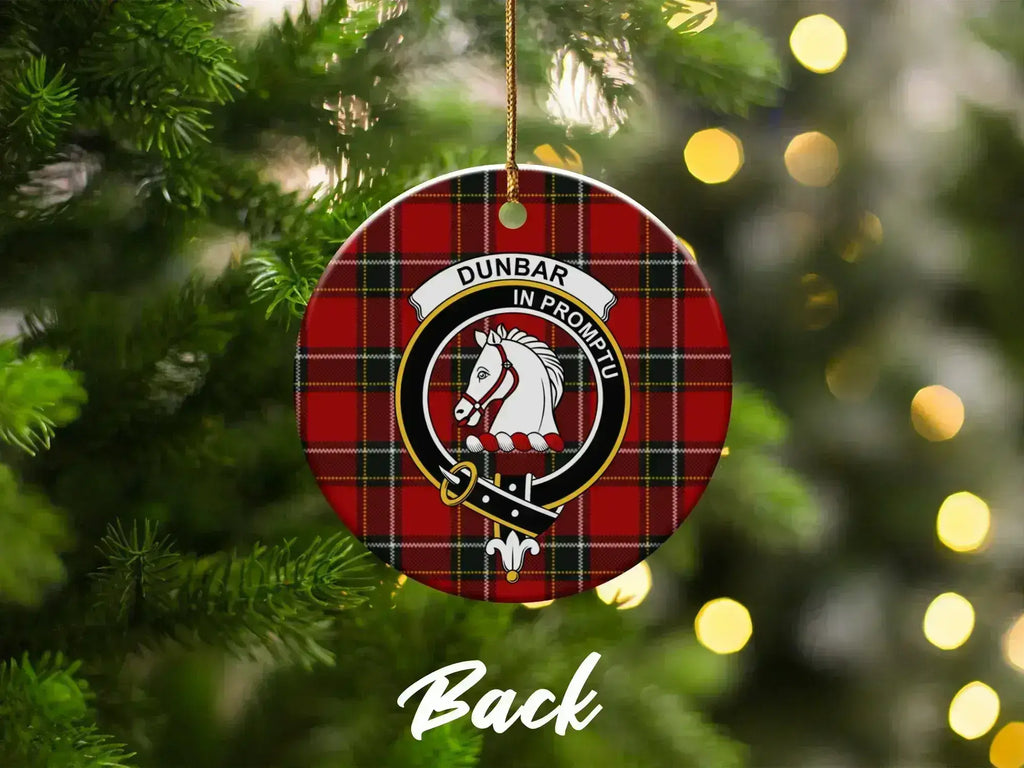 Clan Dunbar Christmas ornament close-up — round ceramic, pre-drilled hole, red tartan design