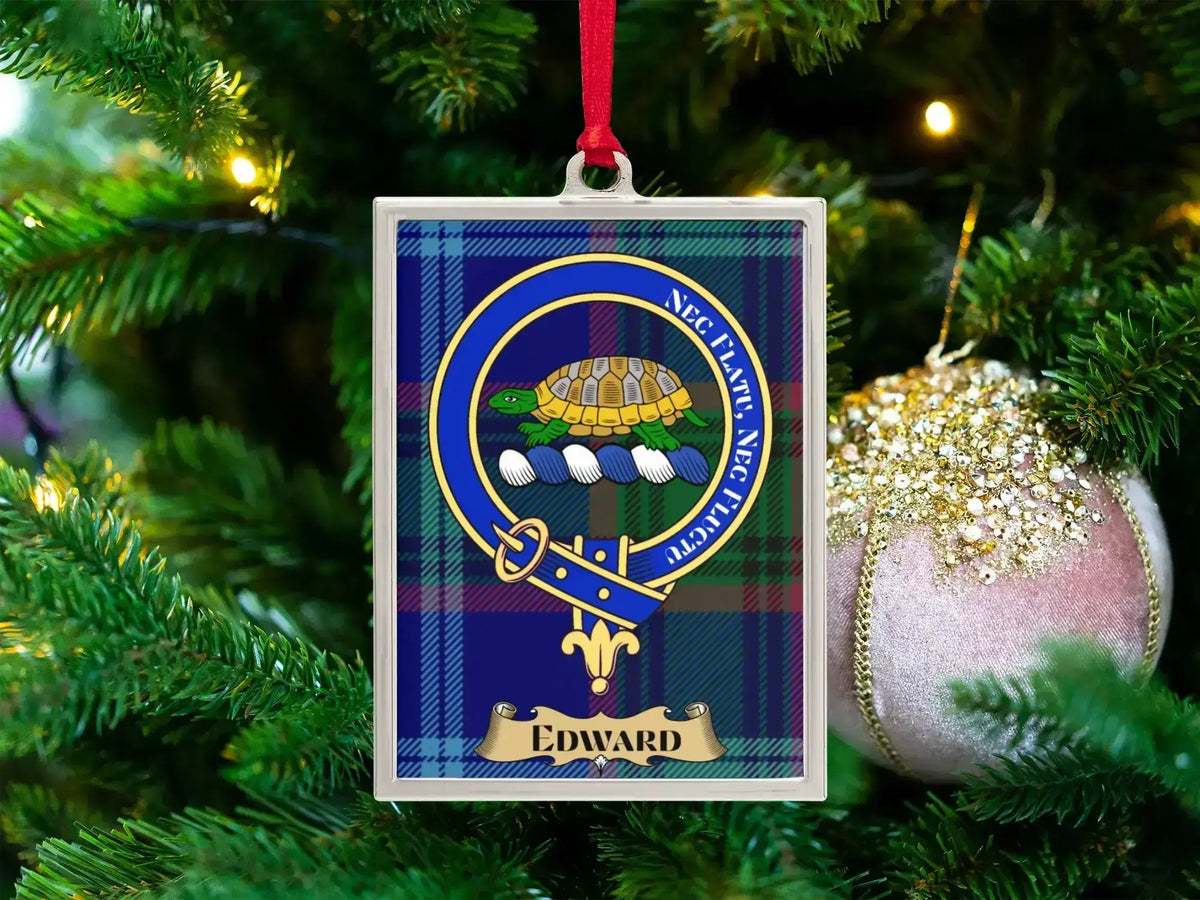 Edward clan crest Christmas ornament in a silver frame on a tartan background