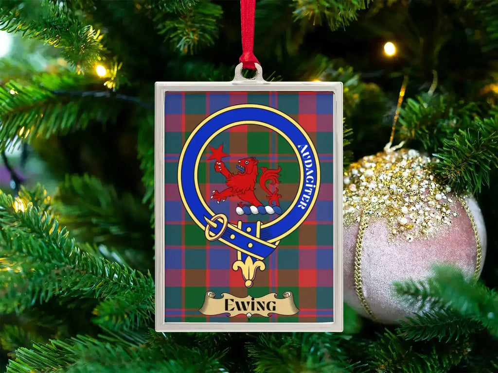 Ewing clan crest Christmas ornament in a silver frame on a tartan background