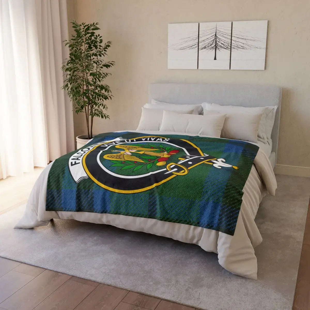 Falconer clan crest throw blanket draped over sofa — full-colour tartan print, white reverse