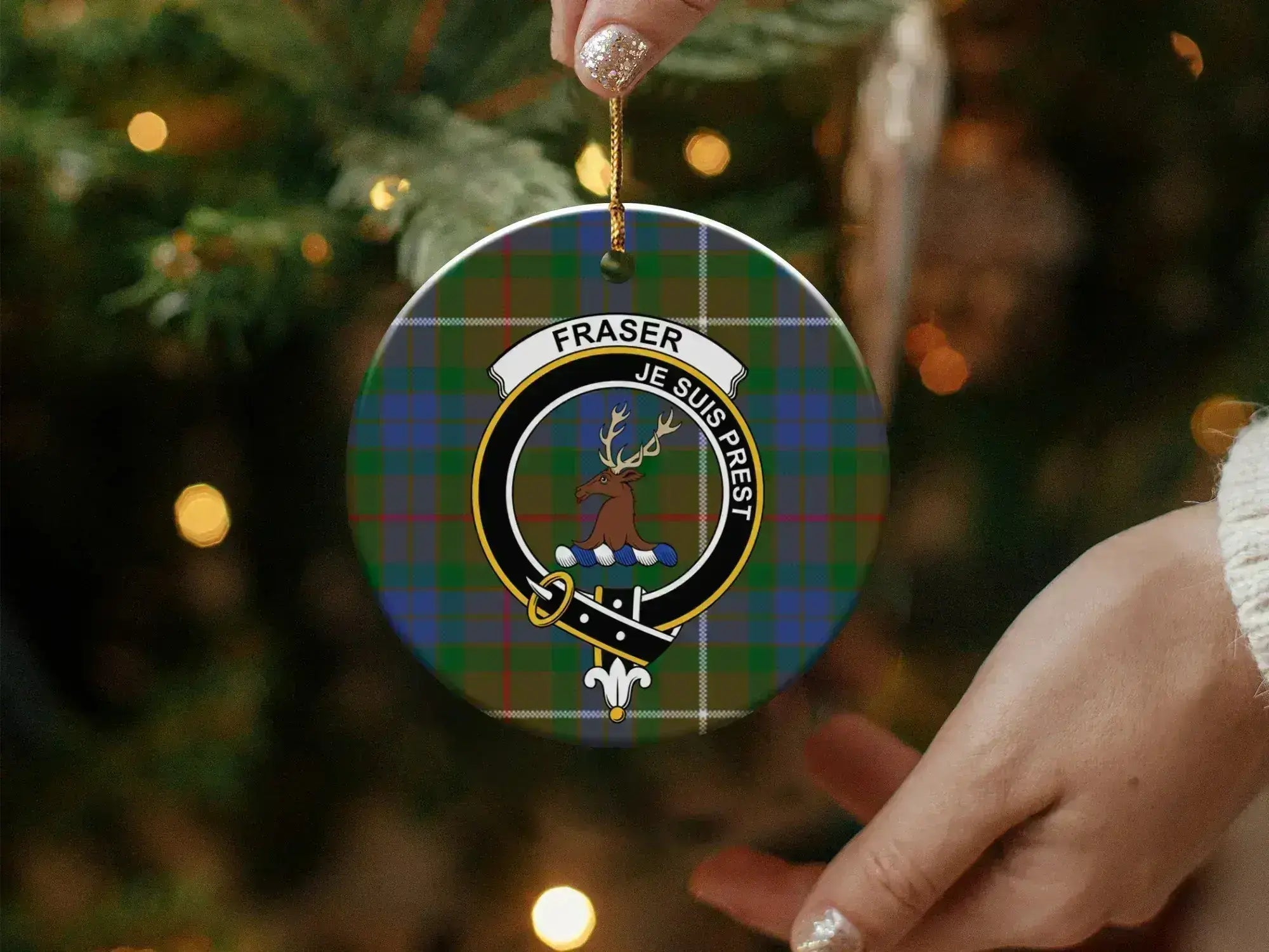 Fraser clan tartan ornament on tree — round ceramic with pre-drilled hole and gold ribbon