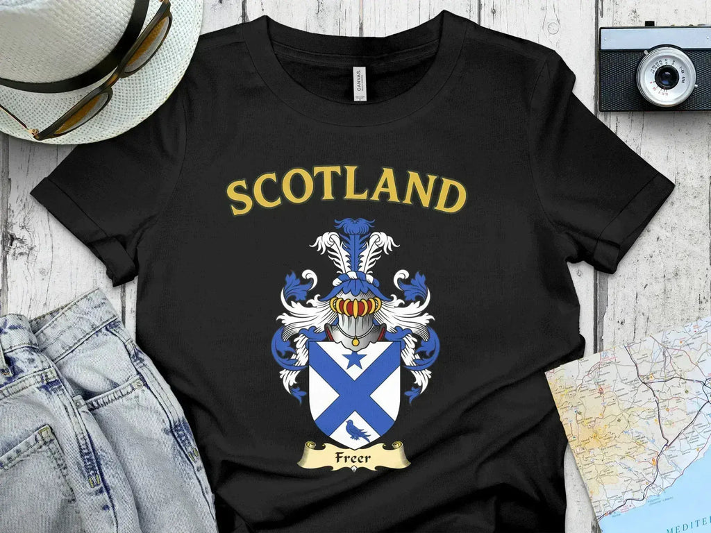 Freer Scottish clan crest t-shirt — front view of the printed crest on a tartan background