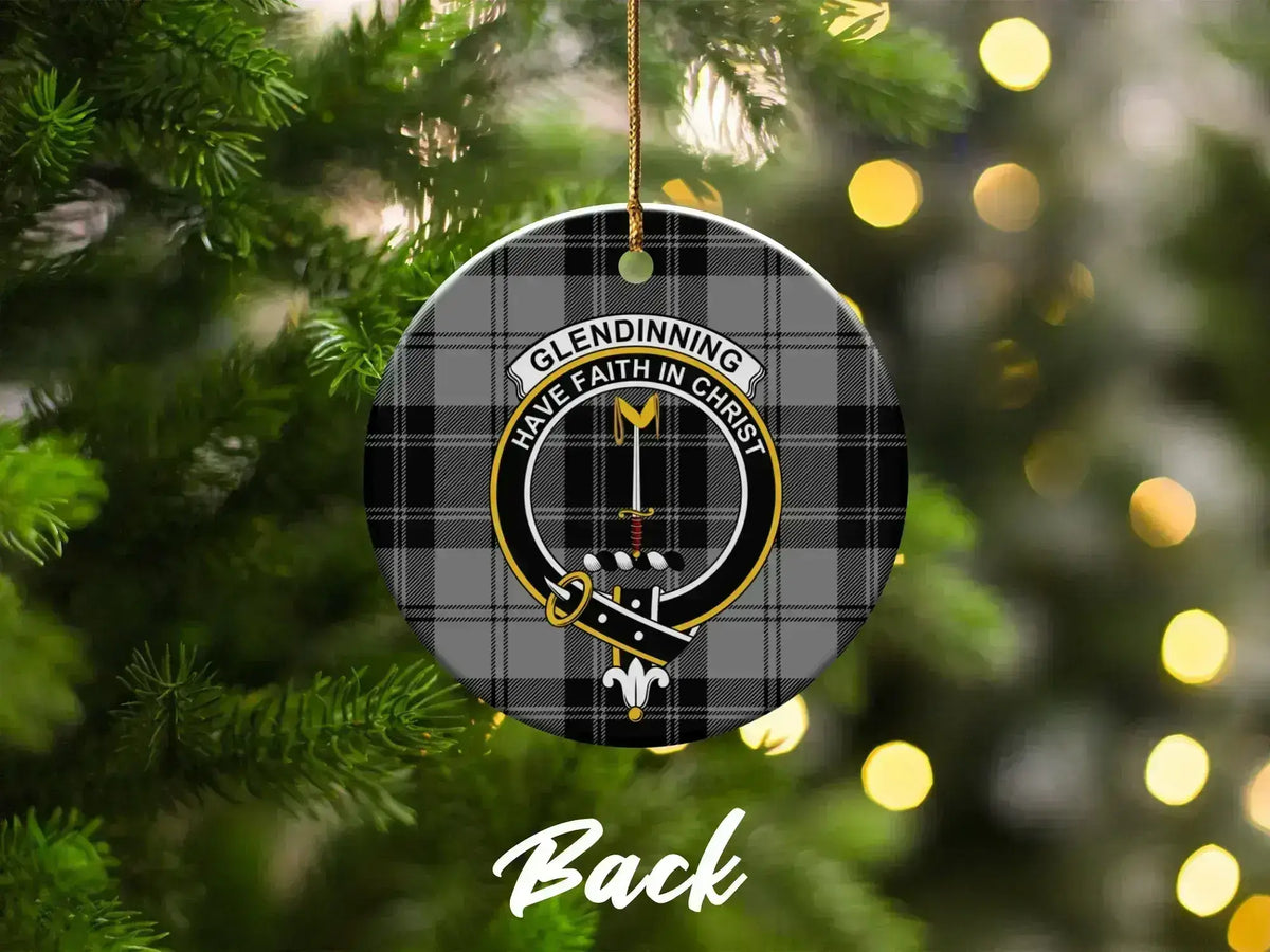 Glendinning clan crest ornament hanging on tree — 3 inch ceramic showing crest and tartan