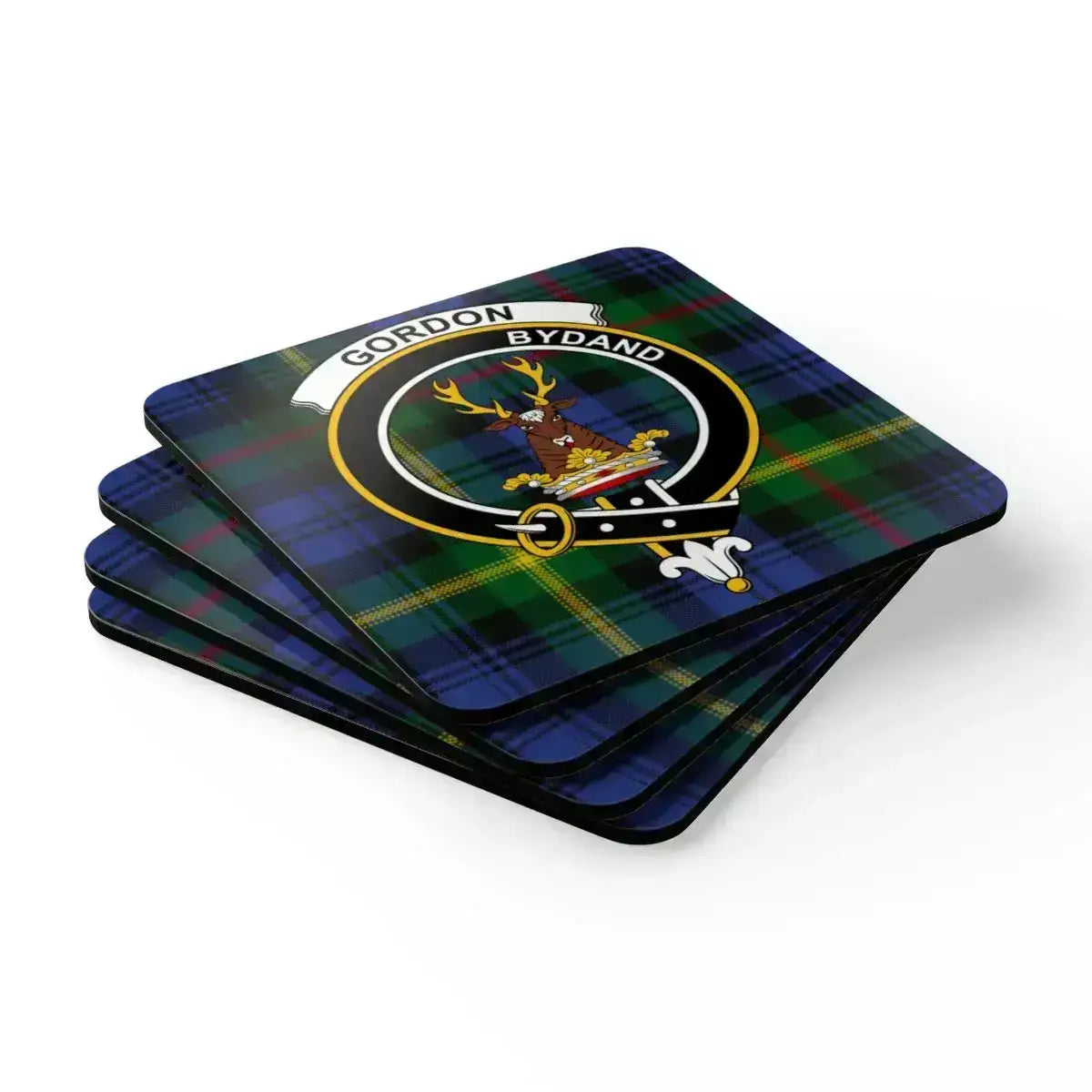 Close-up of Clan Gordon Bydand crest coaster showing detailed tartan print and square cork backing