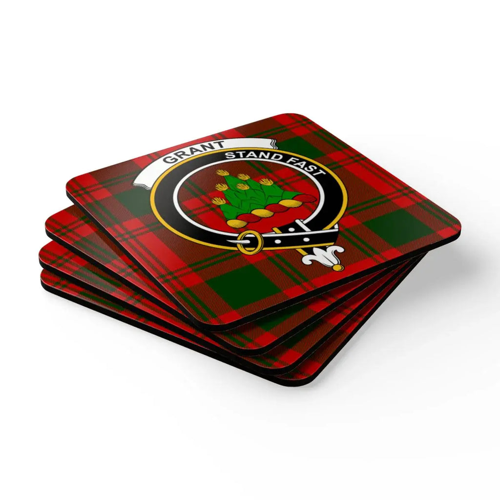 Grant clan crest tartan coasters — four natural cork squares with heraldic Stand Fast design