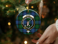 Gunn clan crest tartan ornament close-up — Aut Pax Aut Bellum detail on glossy 3-inch disc