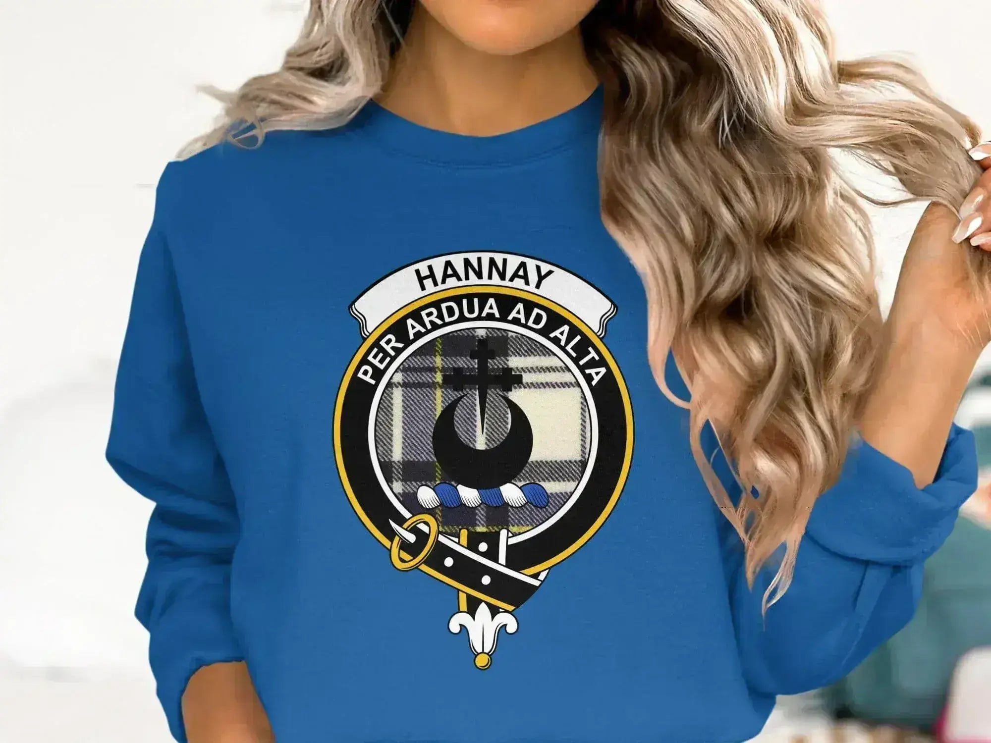 Hannay crewneck sweatshirt in forest green — printed clan crest and tartan on chest