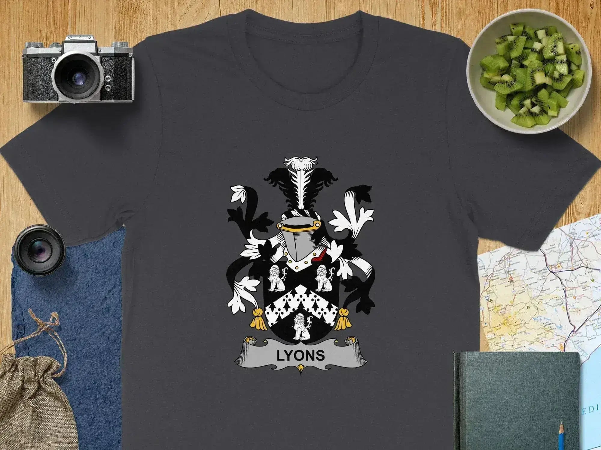 Lyons family crest graphic tee — front view showing heraldic emblem print, retail fit tear-away label