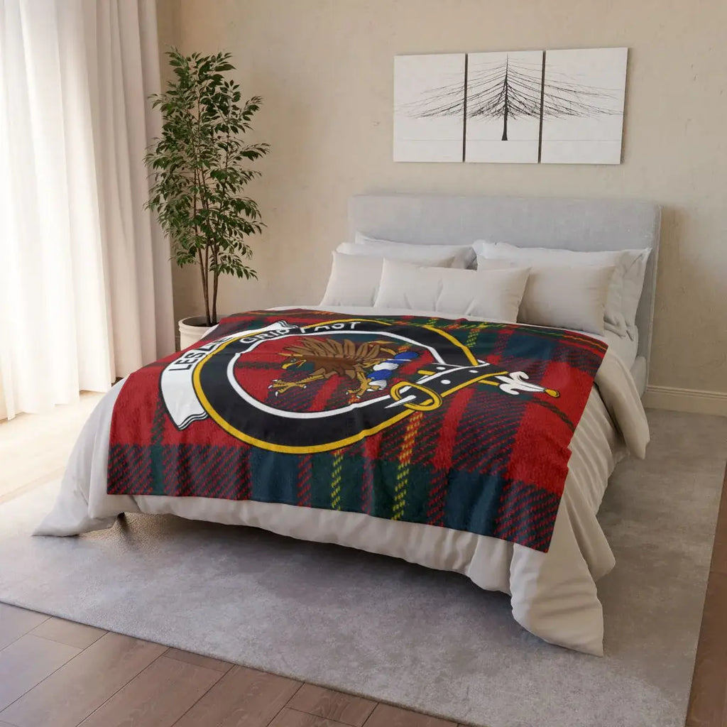 Leslie clan crest tartan throw blanket on sofa — lightweight 100% polyester with clan design