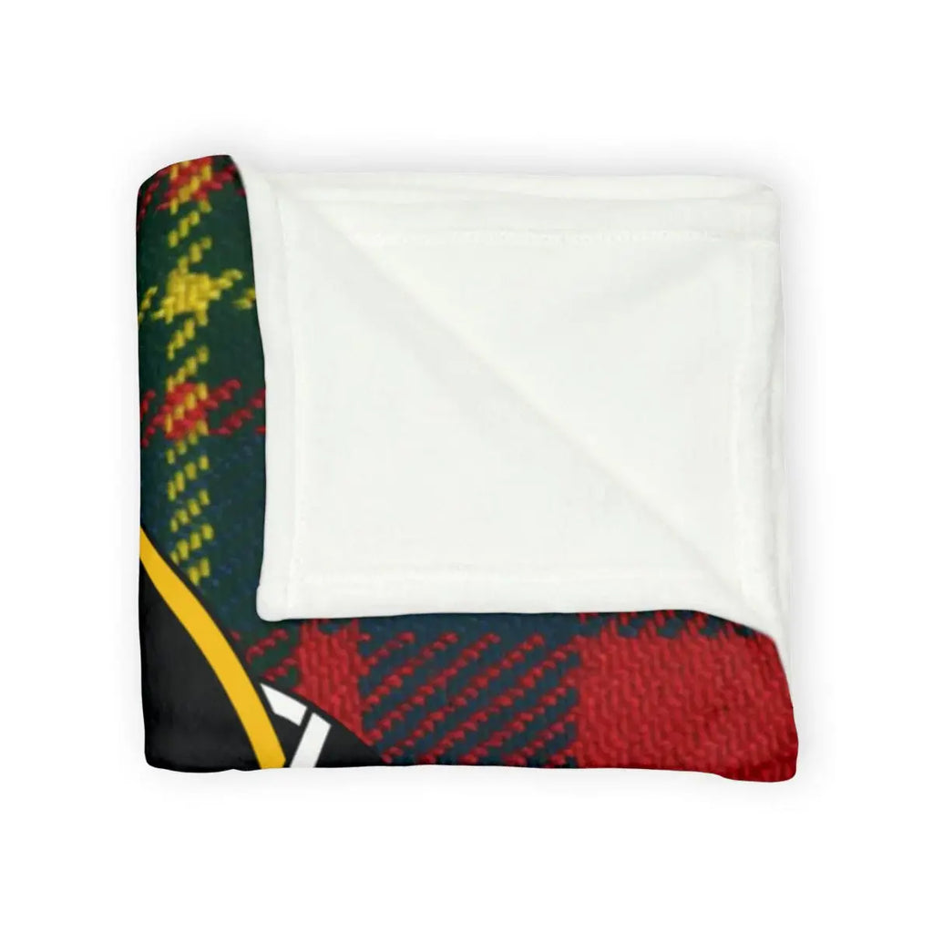 Leslie clan crest throw blanket laid flat — cosy tartan plaid on 100% polyester