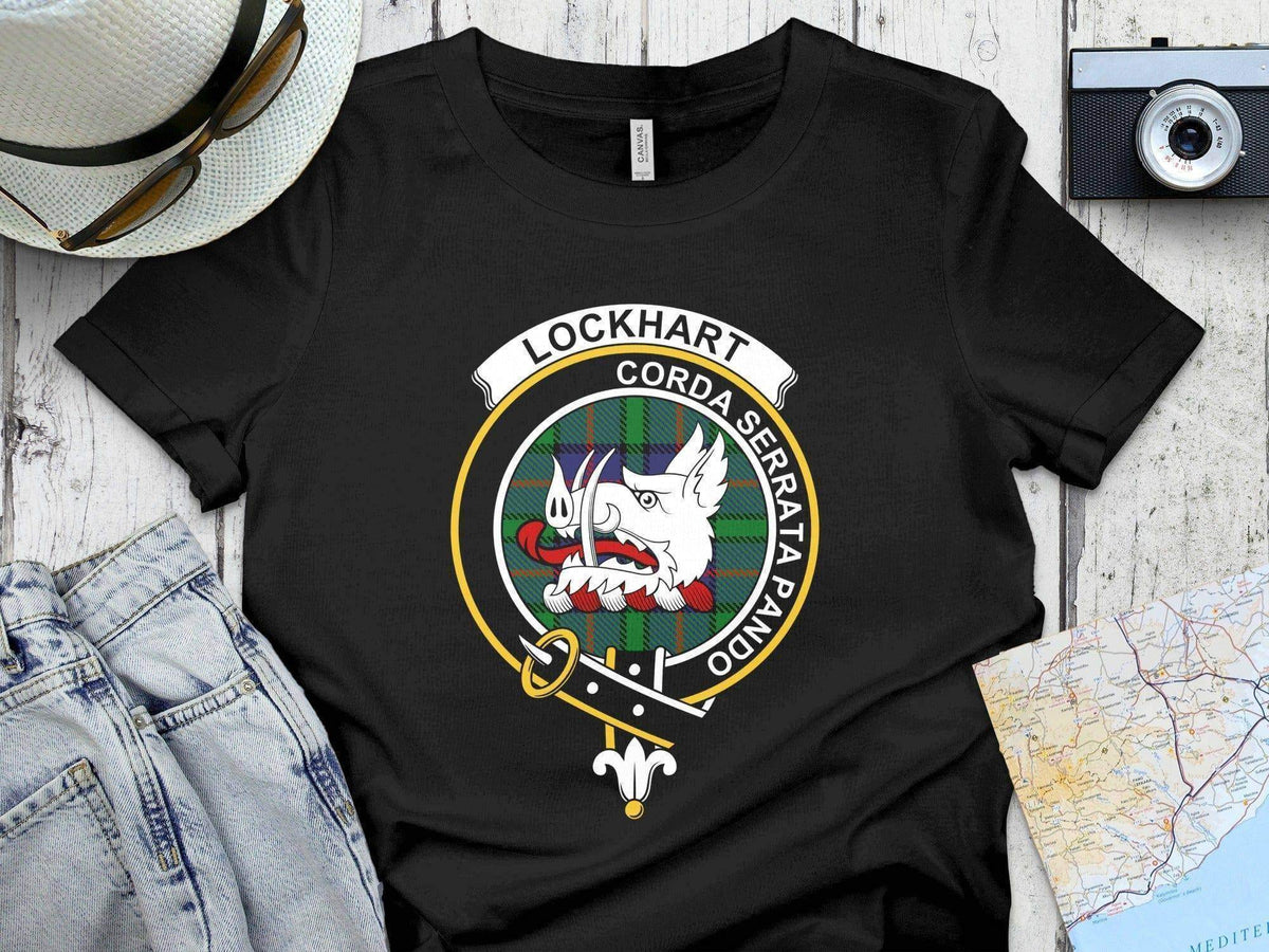 Lockhart clan crest t-shirt — navy cotton short sleeve with printed boar's head and tartan design