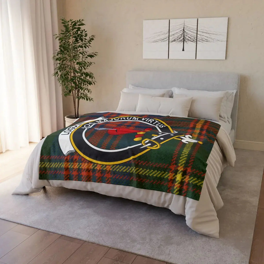 Logan clan crest throw blanket on sofa — lightweight 100% polyester with clan design