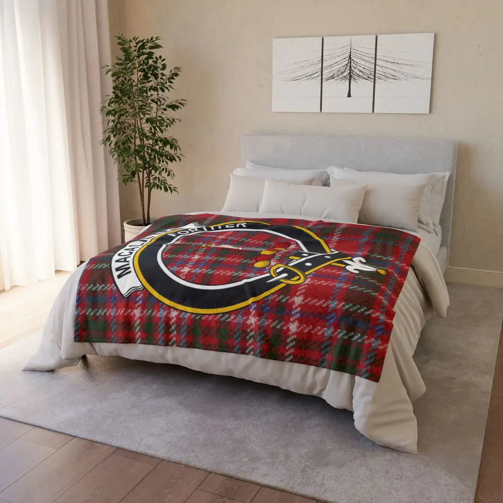 MacAlister clan crest throw blanket on sofa — lightweight 100% polyester with clan design