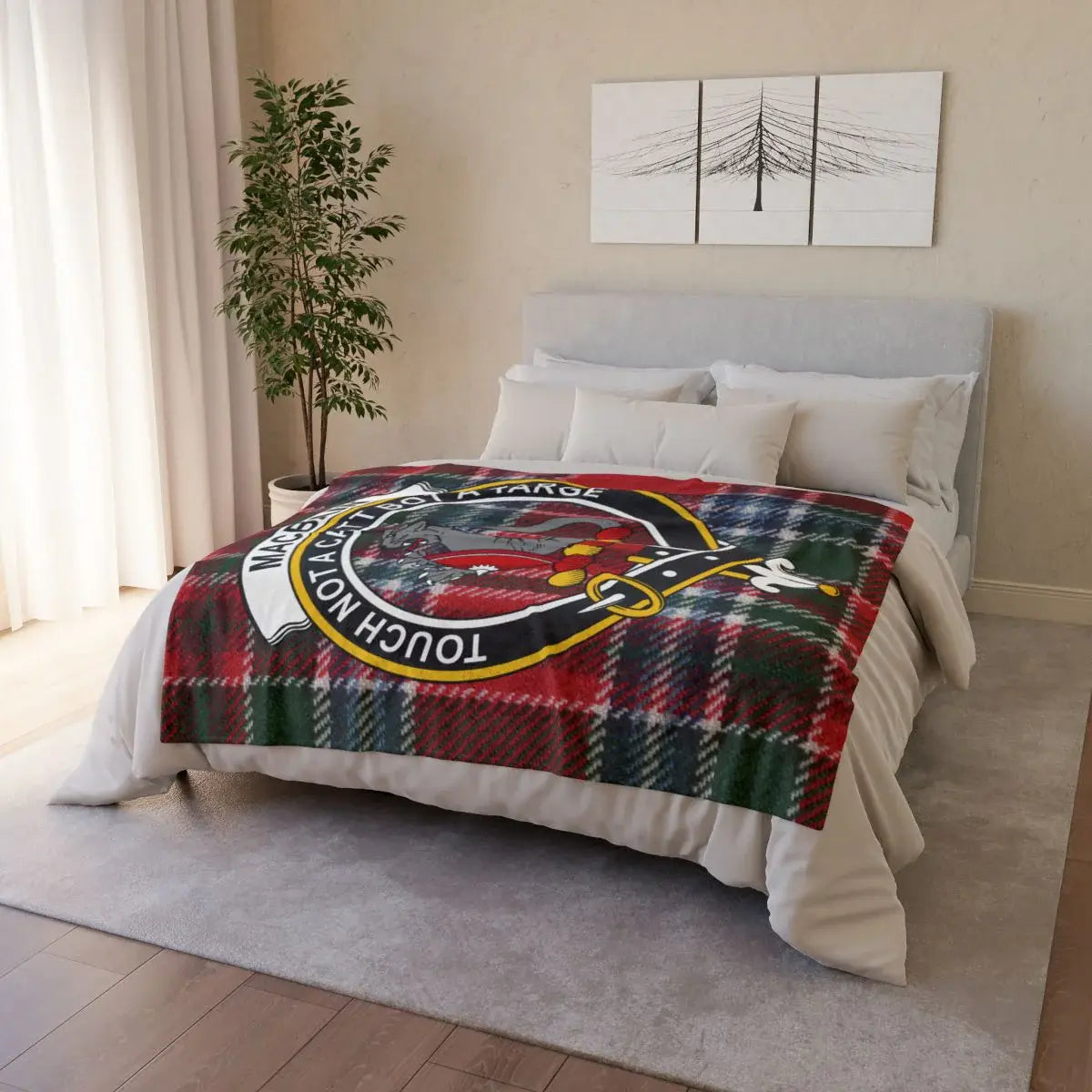 Clan MacBain crest throw — draped view showing tartan and clan crest print, hemmed edges