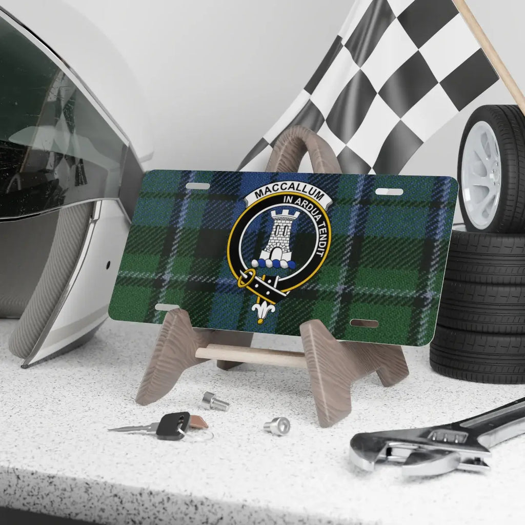 MacCallum clan crest tartan novelty plate — blue and green tartan design on aluminium