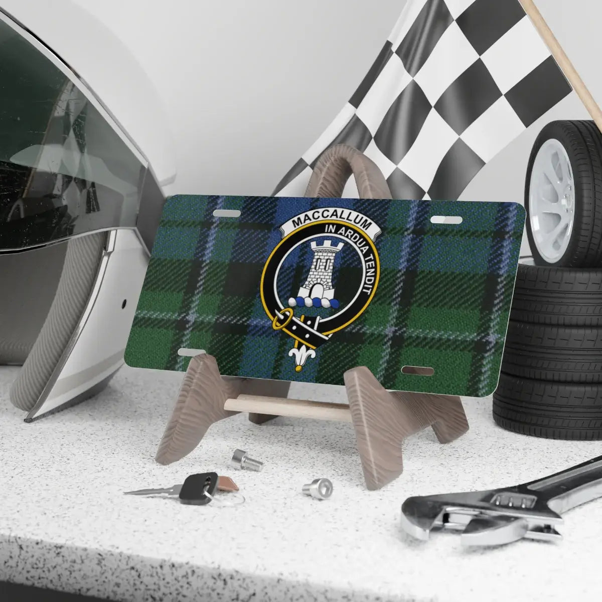 MacCallum clan crest tartan novelty plate — blue and green tartan design on aluminium