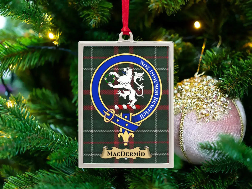 MacDermid clan crest Christmas ornament in a silver frame on a tartan background