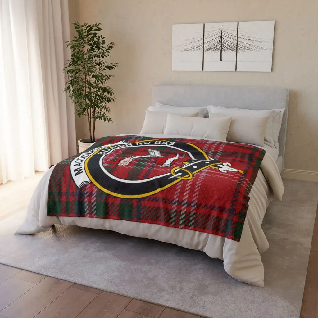MacDougall clan crest throw blanket on sofa — lightweight 100% polyester with clan design