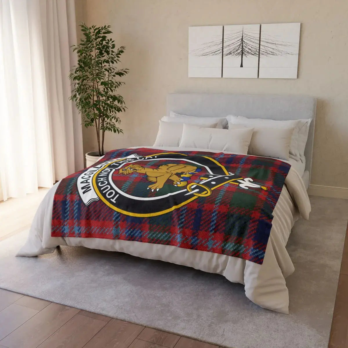 MacGillivray tartan crest throw draped over armchair — lightweight Scottish clan blanket