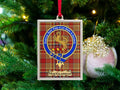 MacGlashan clan crest Christmas ornament in a silver frame on a tartan background