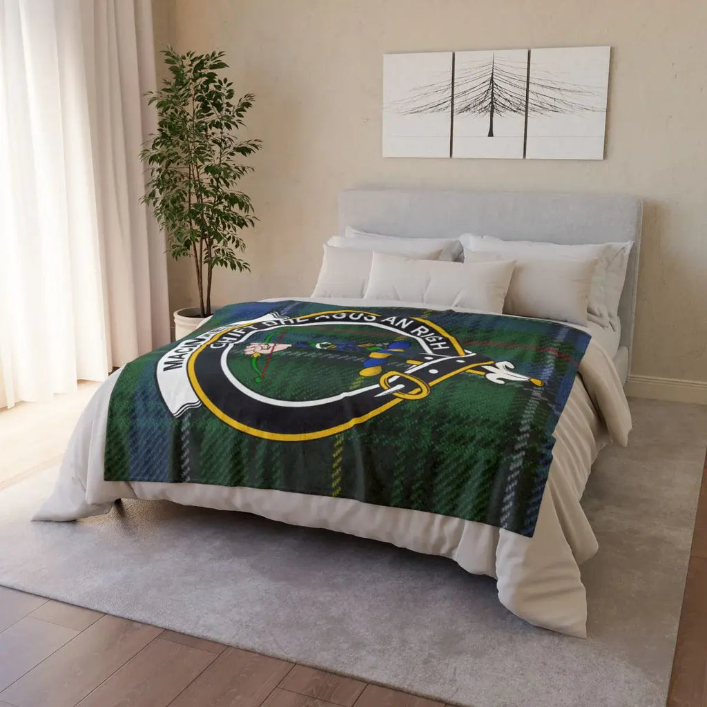 MacInnes tartan crest throw draped over sofa — lightweight Scottish clan blanket in use